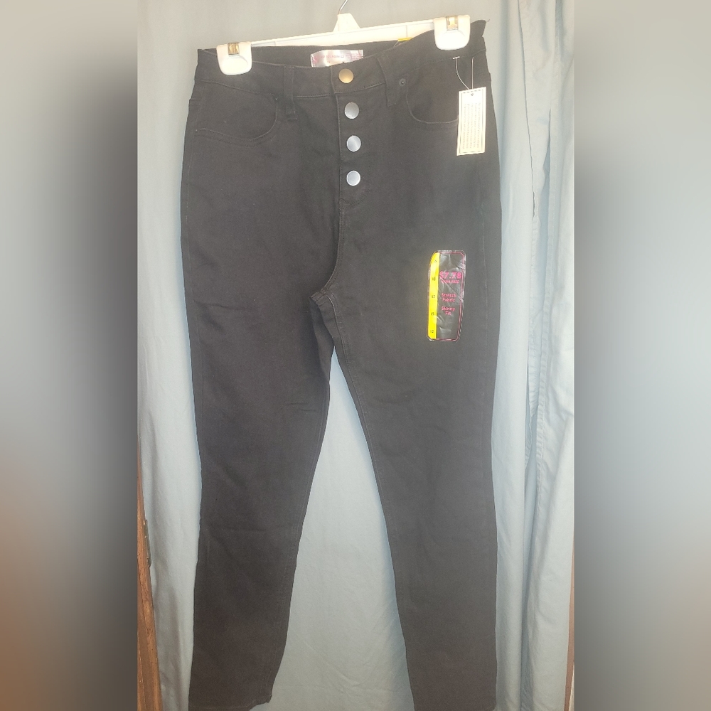 Black buttoned high-rise skinny jeans. NWT. Size 13.